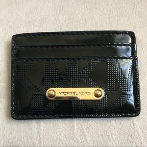 Black Michael Kors mini-wallet